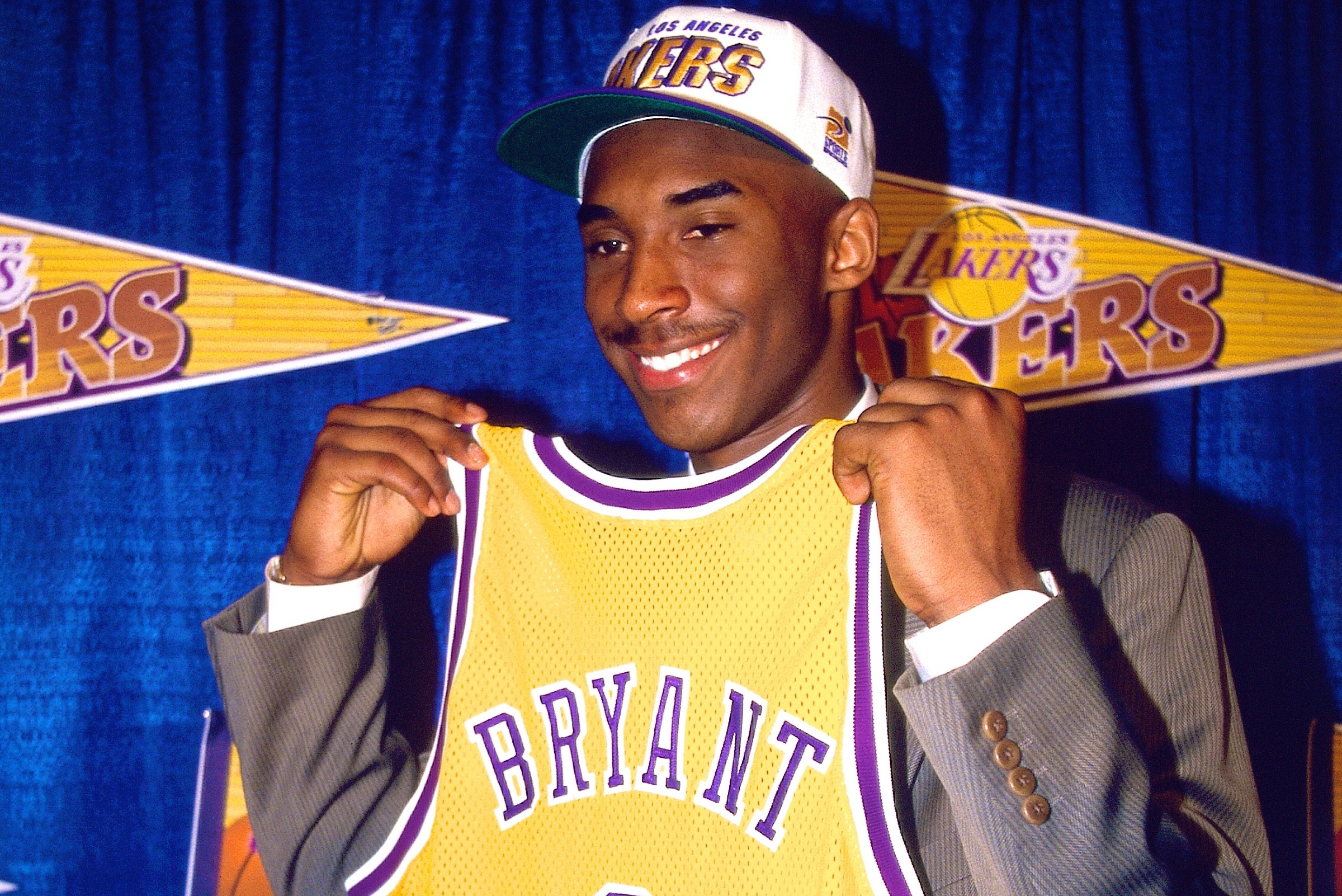 it was rare to see kobe bryant get a DNP, but here's some outfits from when  he did.